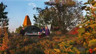 A group of friends on a picnic in autumnal Tasku Island